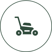 Icon of a lawn mower in a circular frame.